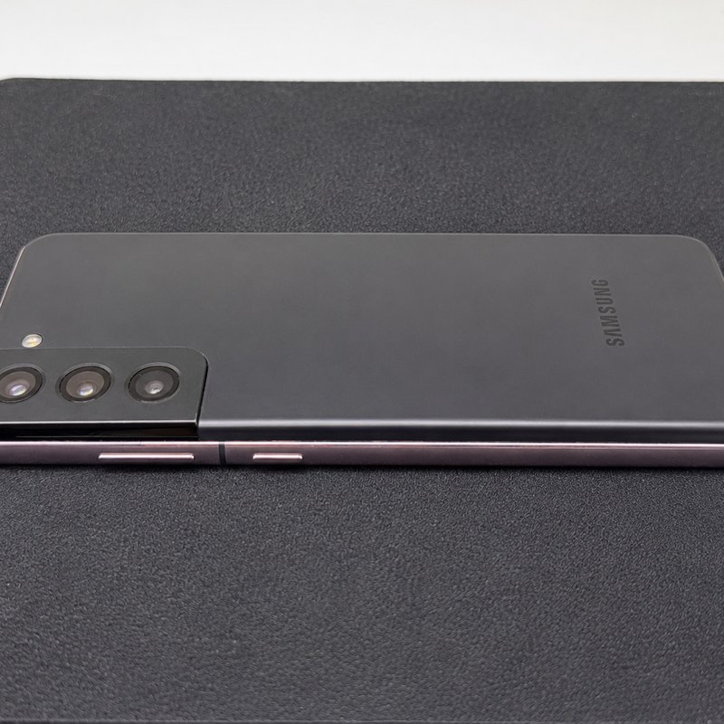 The same Galaxy S21 with a new battery fitted and the back panel sealed flat