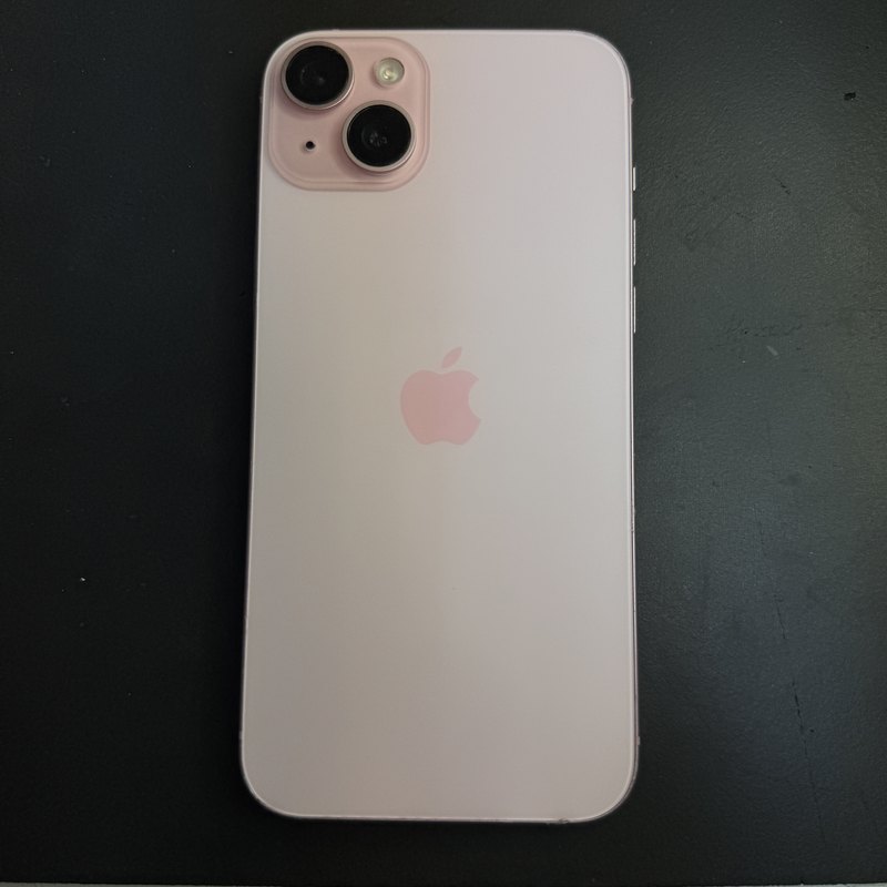An iPhone 15 in pink, finished and handed back after an on-site repair in Scranton